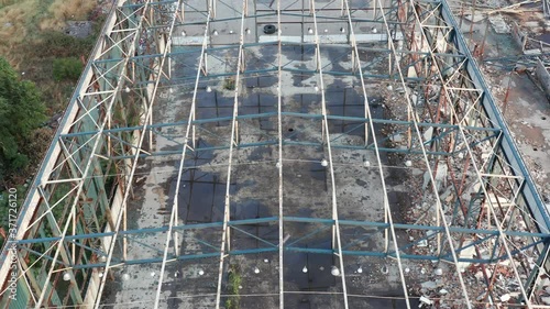 Wallpaper Mural Metal construction of an abandoned and derelict industrial hall of a defunct factory. Aerial top view. Torontodigital.ca