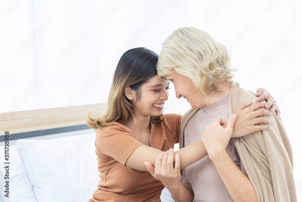 Close up Multi culture family hugging together on the bed with happiness and love.Unusual appearance, diversity, heredity concept. Close up Multi culture family hugging together on the bed with happiness and love.Unusual appearance, diversity, heredity concept.