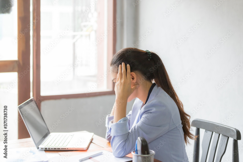 Asia business women feeling headache and stress Asia business women feeling headache and stress