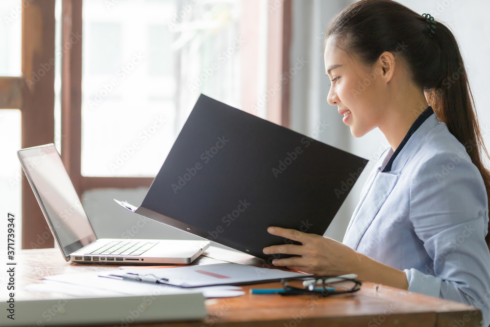 Business asian woman working at home with online technology Business asian woman working at home with online technology
