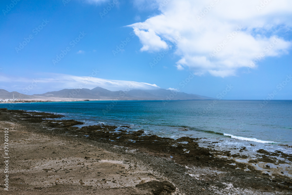Rocky Atlantic coastline at low tide. Fuerteventura. Canary Islands. Spain.