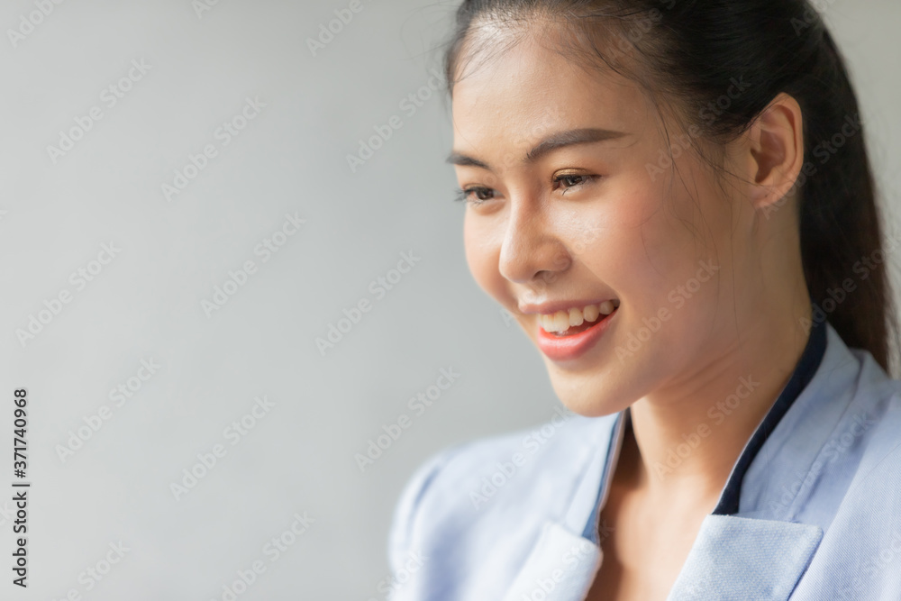 Portrait of a young smiling asian business woman Portrait of a young smiling asian business woman