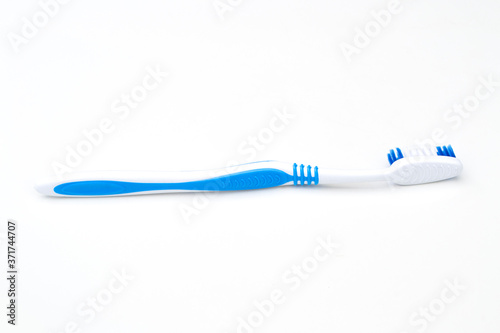 Toothbrush isolated on white background, oral and dental cleaning supplies.