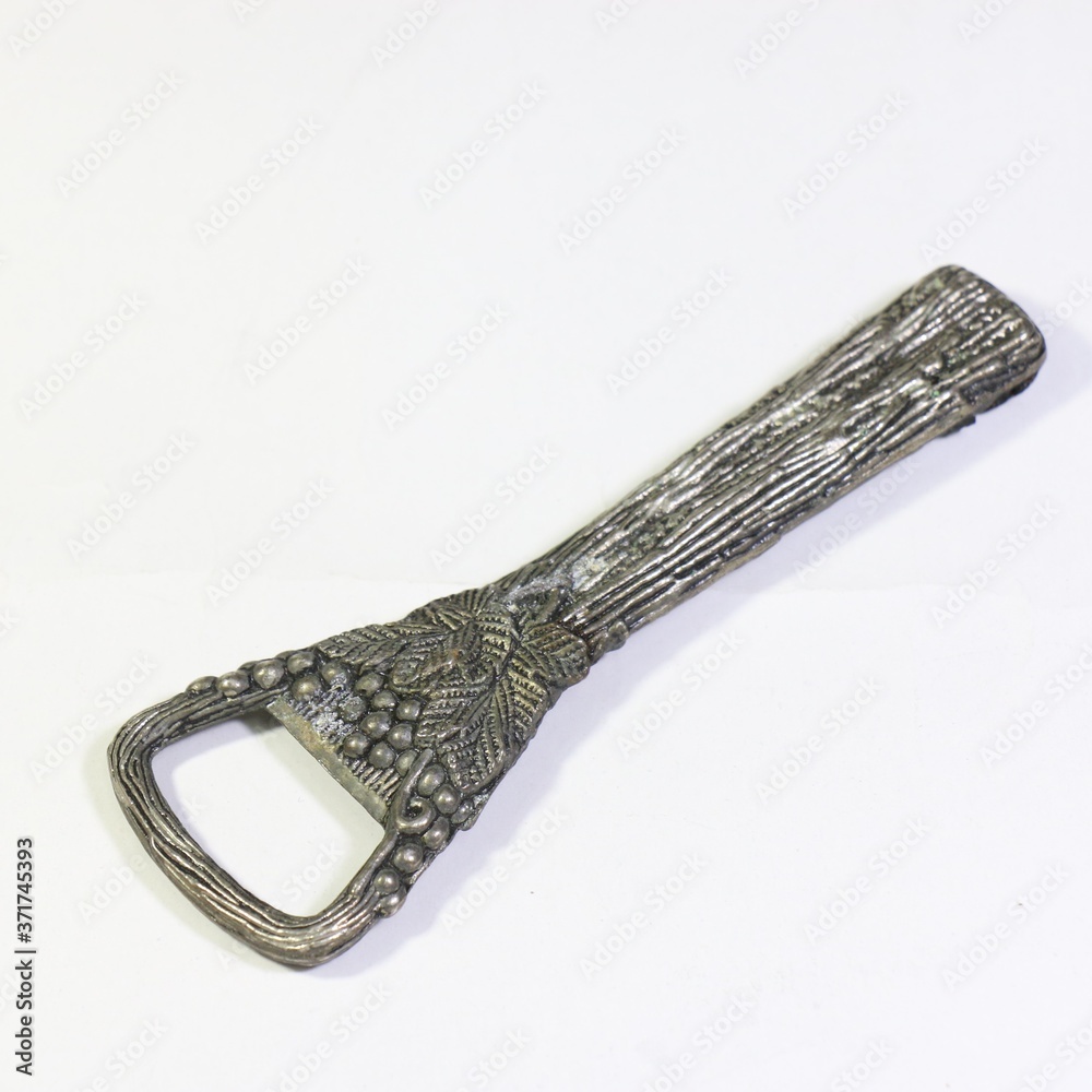 A beautiful decorated old can opener