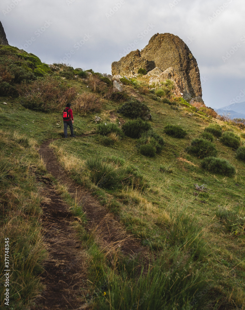 Man walking in the mountain in a lookout of the Picos de Europa