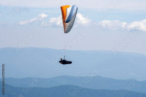 beautiful paragliding over the carpathians. flight over the mountains
