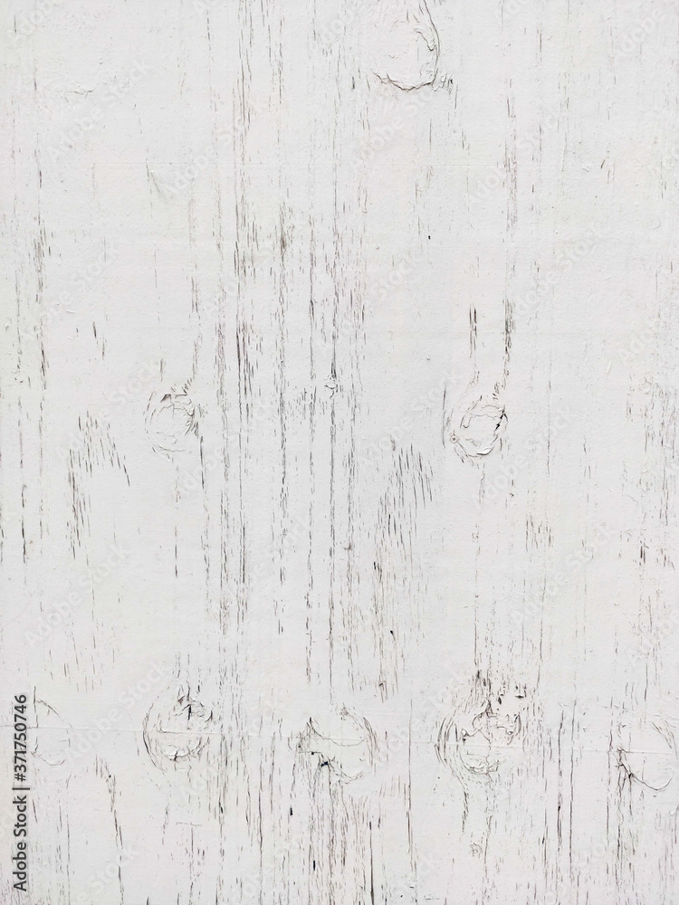 Obraz premium White painted wooden board with visible wood grain
