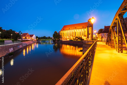 Wroclaw, Poland August 5, 2020; Cityscape of Wrocław at dusk on the Odra River.