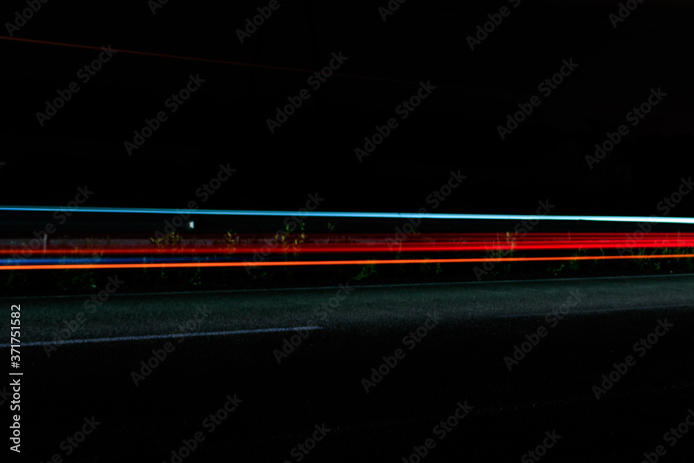 Fototapeta premium Traffic light trails on a highway at night