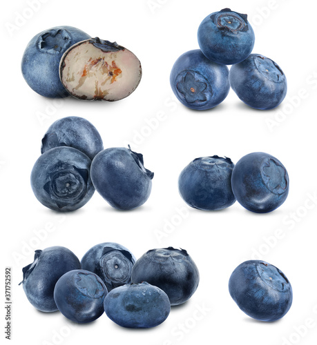 Set of fresh ripe blueberries on white background