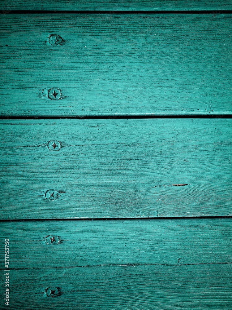 Fototapeta premium dark background of turquoise boards