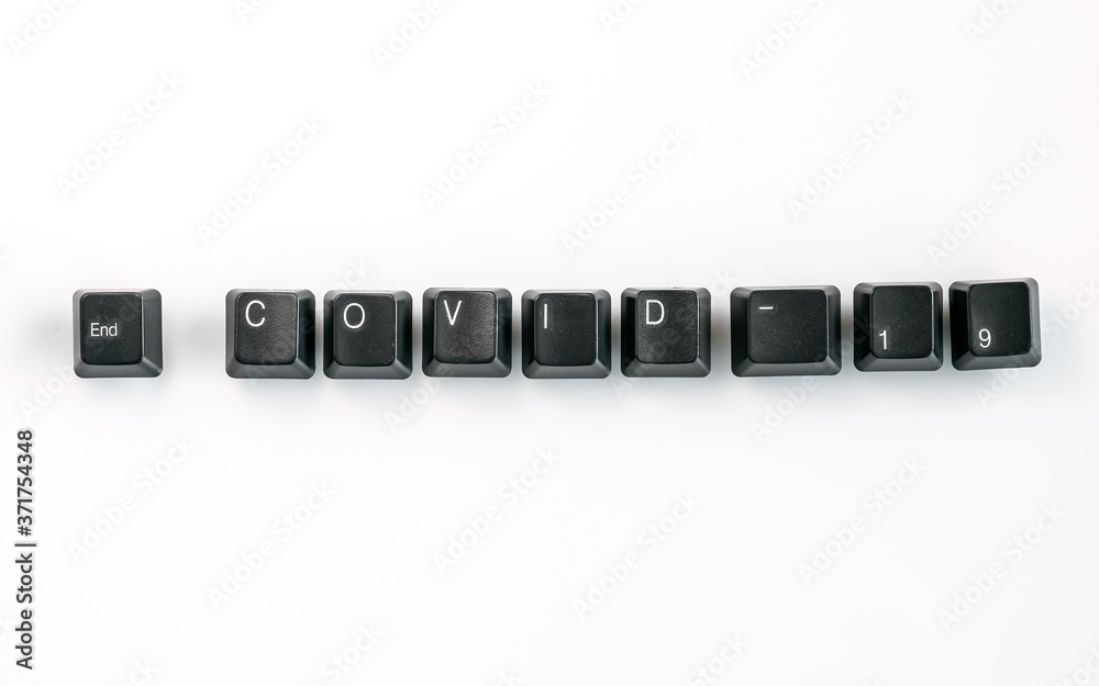 Computer keyboard keys spelling End Covid-19, isolated on white background Computer keyboard keys spelling End Covid-19, isolated on white background