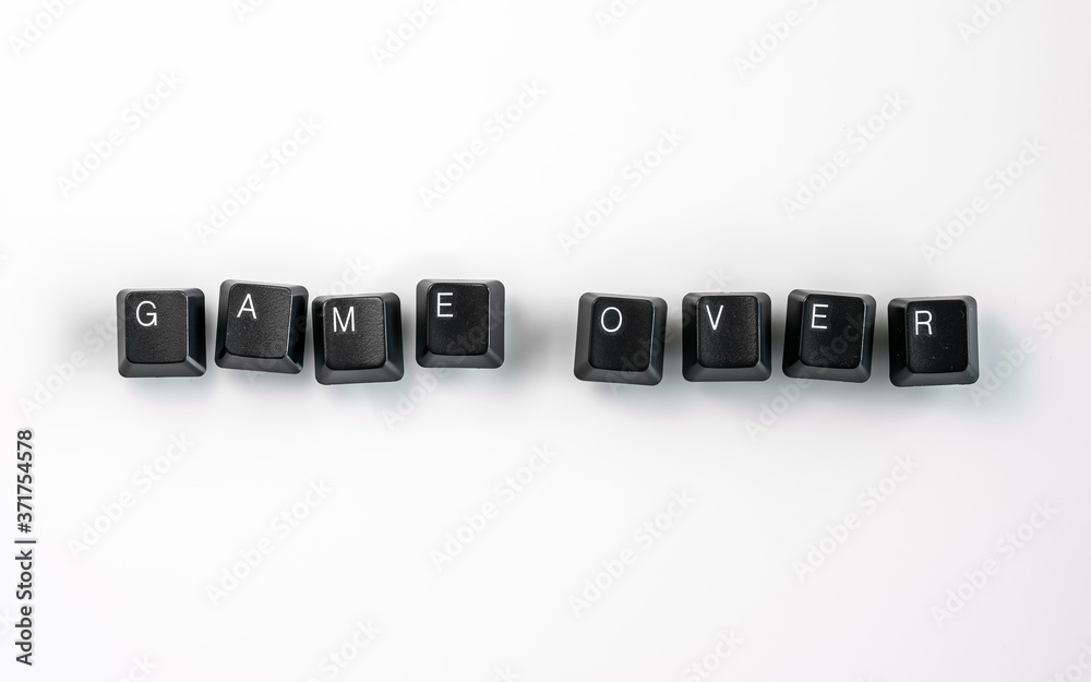 Computer keyboard keys spelling Game Over, isolated on white background Computer keyboard keys spelling Game Over, isolated on white background