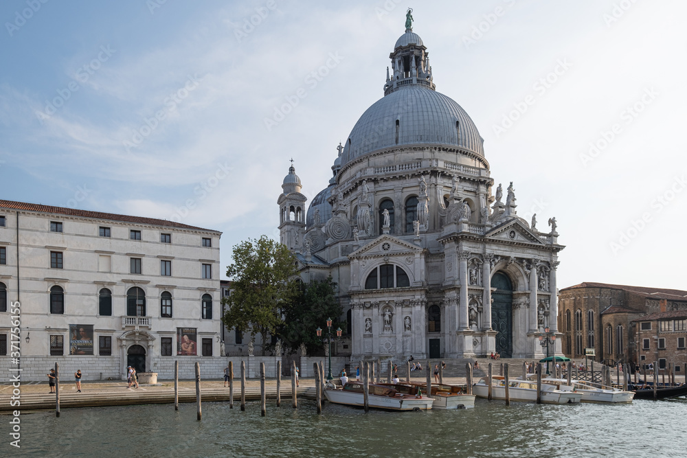 Venice is a city on an island in the Adriatic Sea, in the Venetian lagoon. A city with many canals and bridges with the main Grand Canal and the largest St. Mark's Square