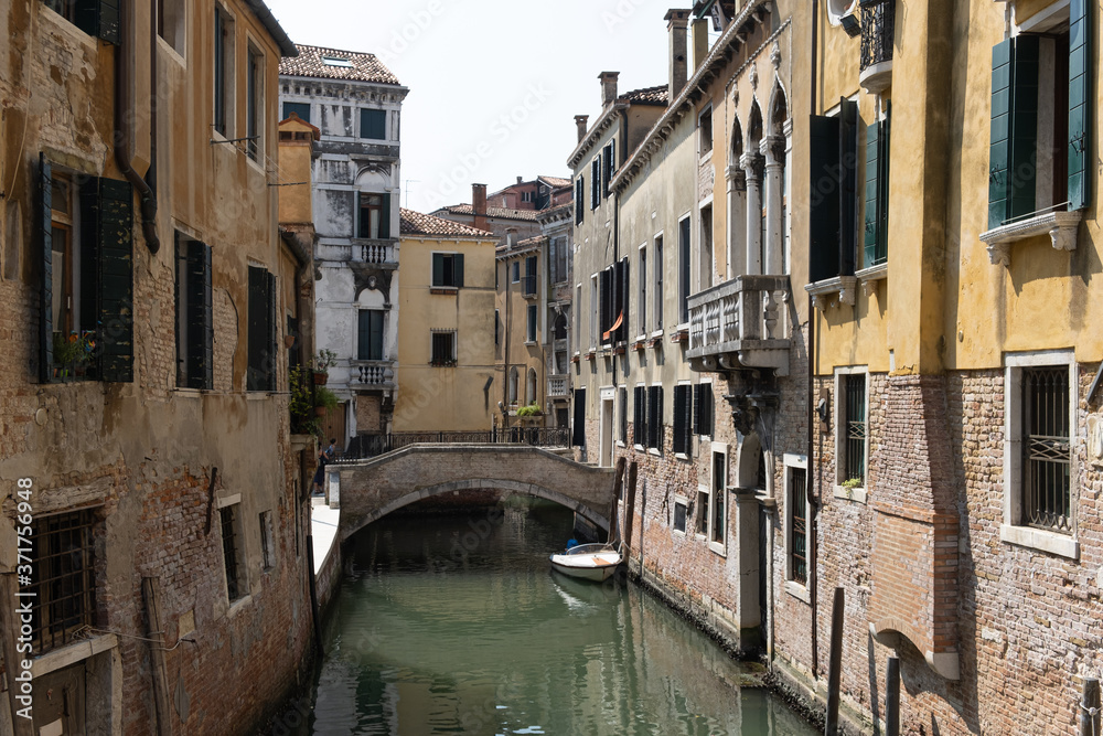 Venice is a city on an island in the Adriatic Sea, in the Venetian lagoon. A city with many canals and bridges with the main Grand Canal and the largest St. Mark's Square