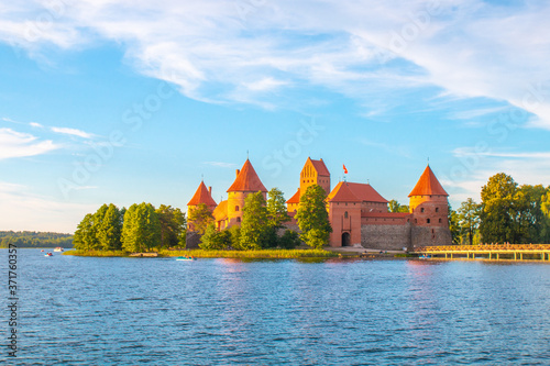 TRAKAI/LITHUANIA: 09/07/2019: Colorful Landscape of Trakai Historical National Park, UNESCO world heritage site, on beautiful summer day. Trakai Island Castle, reflecting in clear water of Galve lake.
