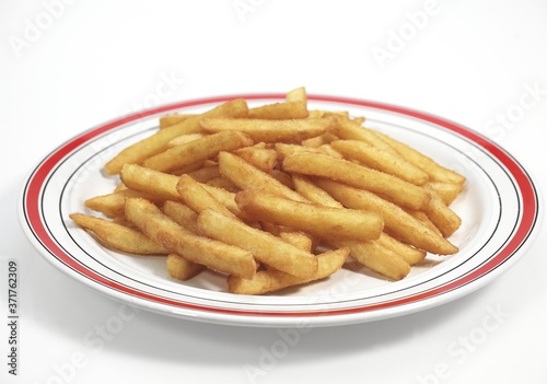 Plate with French Fries against White Background