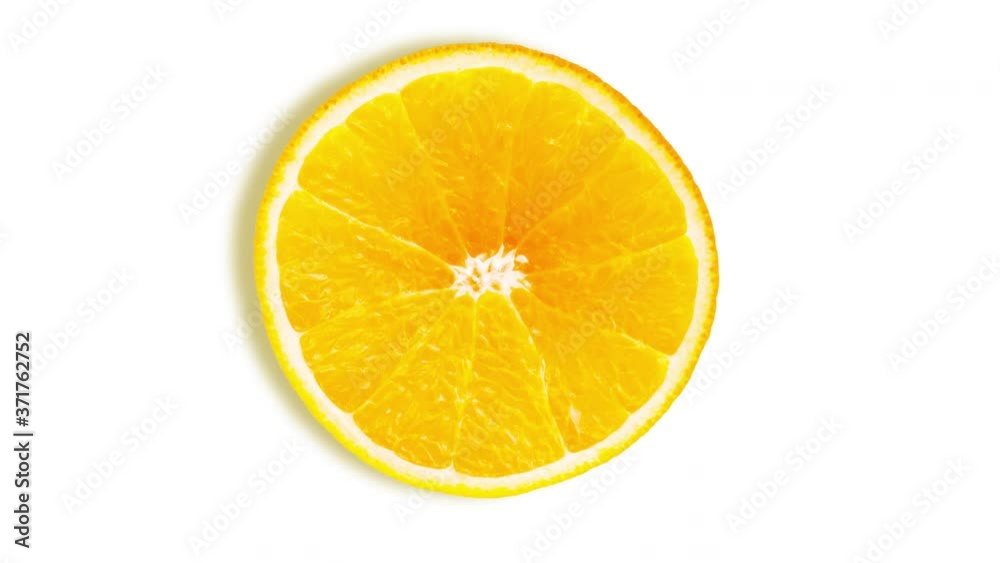 Rotating bright orange fruit slice cut animation. White background. Rotating bright orange fruit slice cut animation. White background.