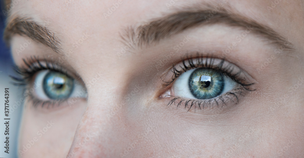 Selfportrait Close-up of a woman's green/blue eyes and dark brown eyebrows Selfportrait Close-up of a woman's green/blue eyes and dark brown eyebrows