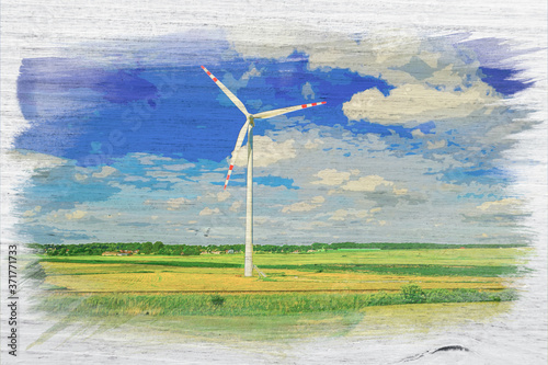 Wind turbine on yellow rape...