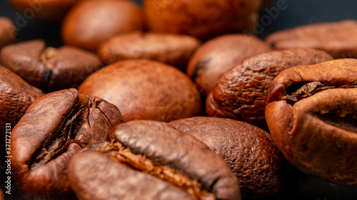 Coffee beans and ground coffee in a macro shot, close-up © Вячеслав Огнев
