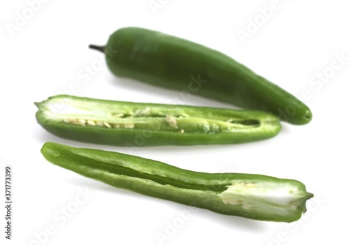 Green Chili Pepper, capsicum annuum against White Background