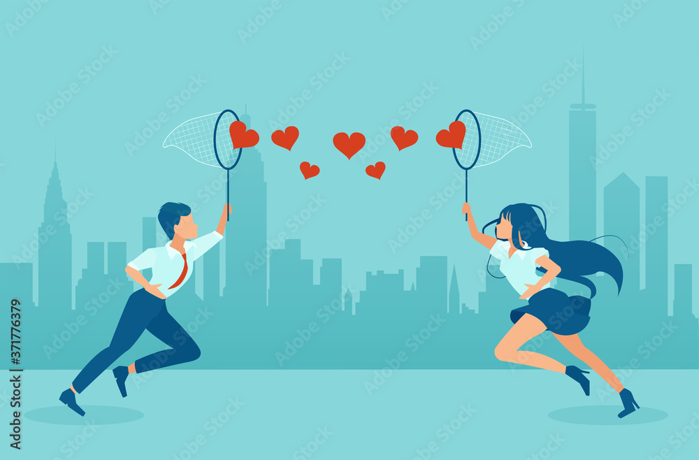Vector of a man and woman using butterfly nets to catch red hearts flying in the air