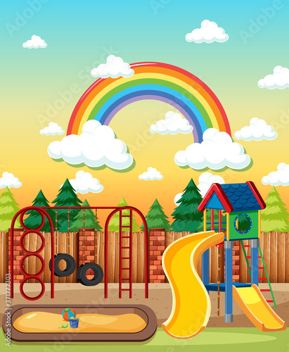 Kids playground in the park with rainbow in the sky at daytime cartoon style
