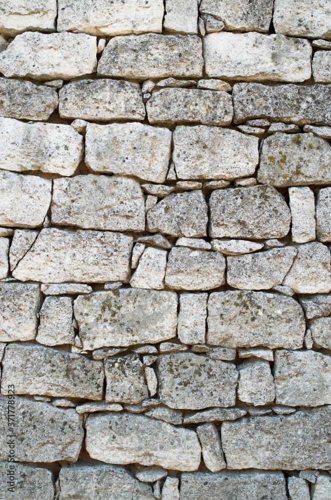Old white stone wall  closeup