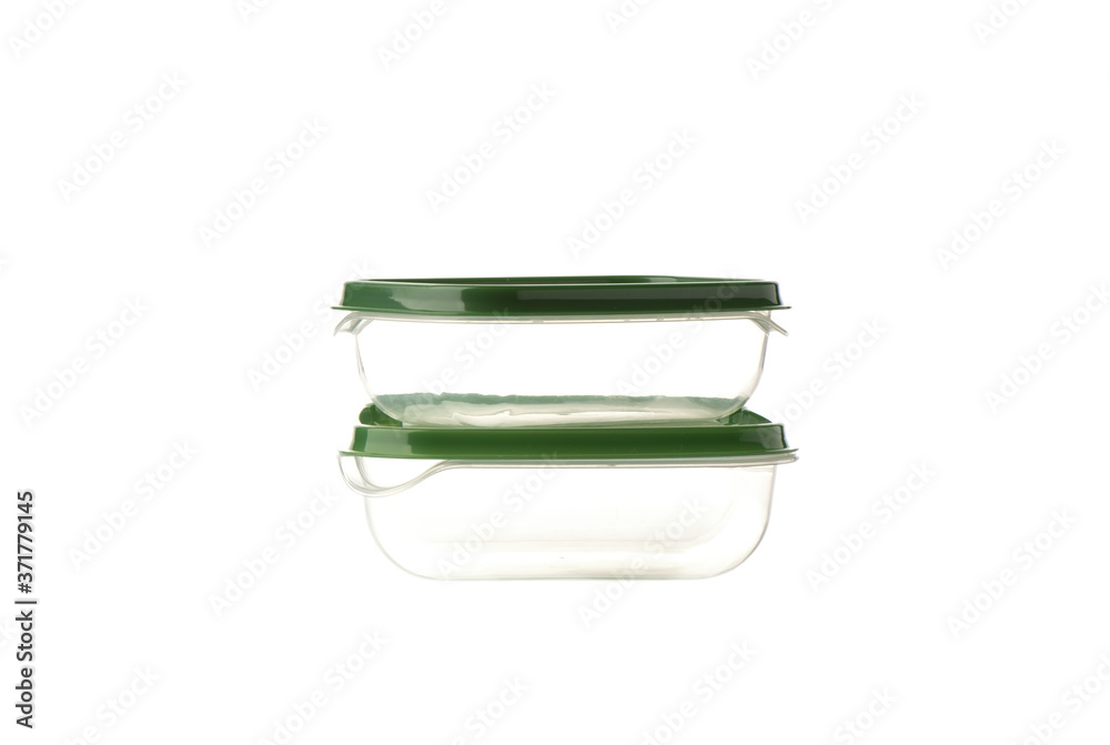Two transparent plastic containers for food isolated on a white background. Two transparent plastic containers for food isolated on a white background.