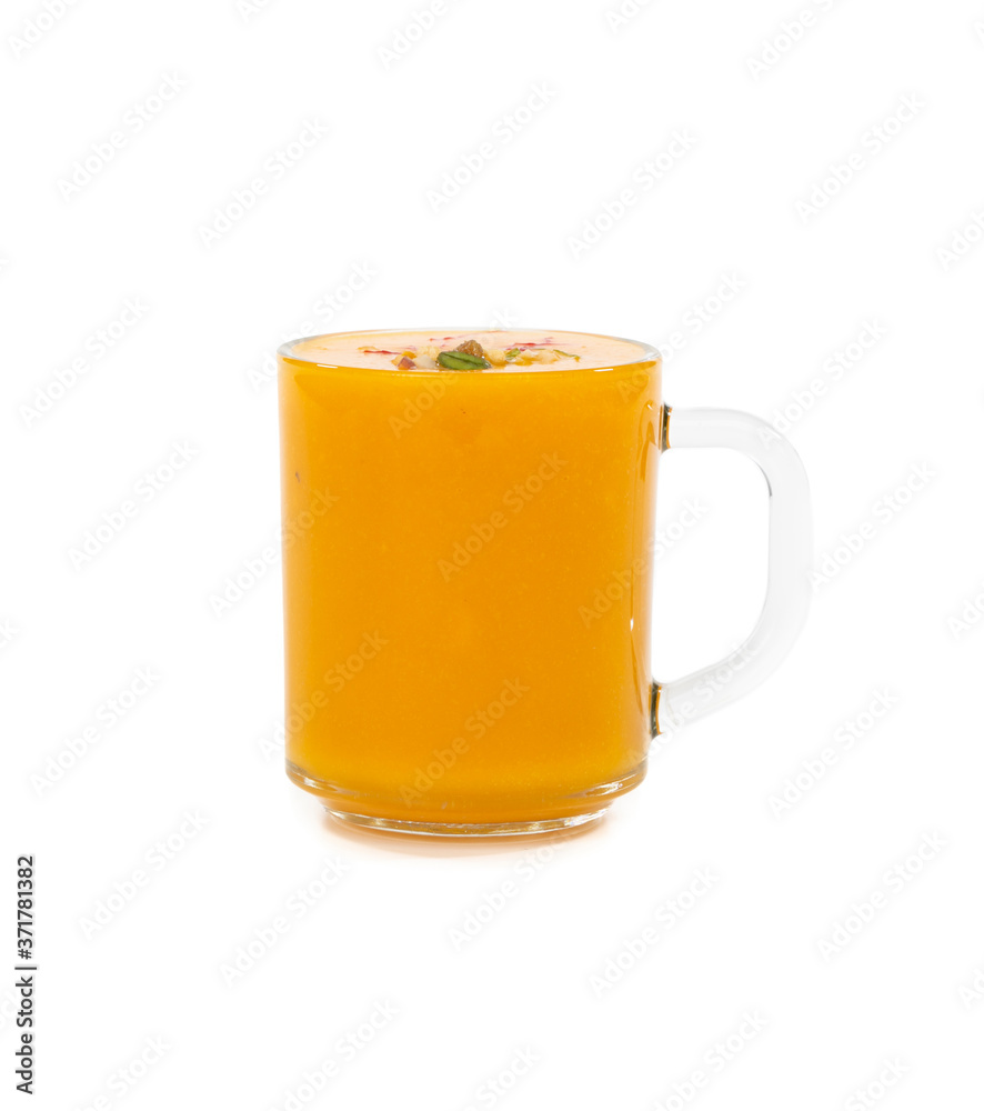 Fresh mango fruit juice on white background Fresh mango fruit juice on white background