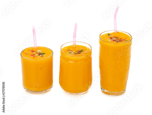 Fresh mango fruit juice on white background photo