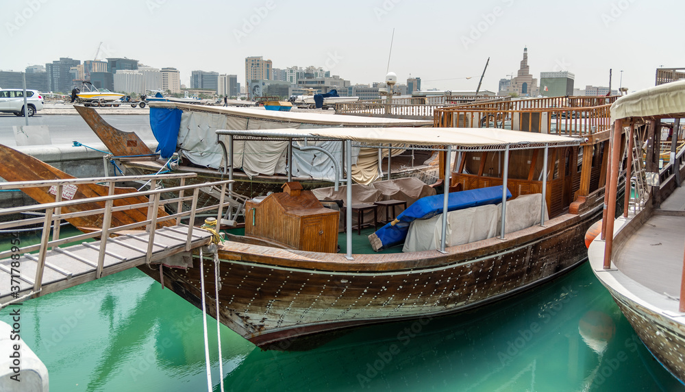 Traditional wooden boats in the Corniche marina at Doha. Traditional wooden boats in the Corniche marina at Doha.