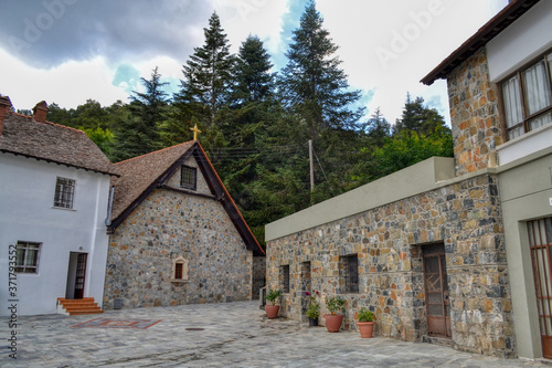 Buildings on the territory of the Trooditissa Monastery - the male monastery of the Paphos Metropolis of the Cyprus Orthodox Church, located in the Troodos Mountains photo