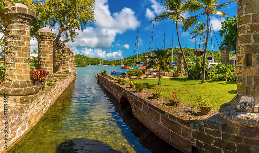 A panorama view across a causeway in the English Harbour in Antigua - obrazy, fototapety, plakaty 