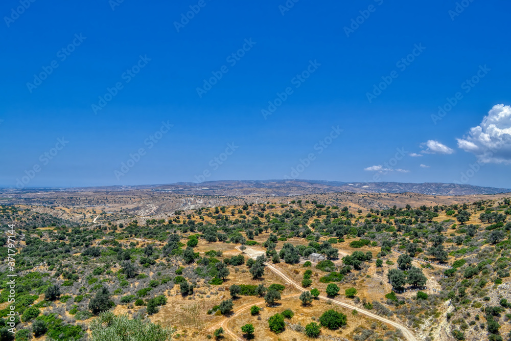 Valley in the Troodos Mountains, Cyprus.  View of the valley from a mountain road on a hot sunny day.