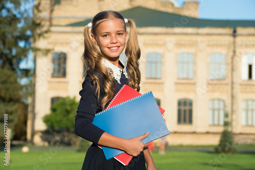 Perfect girl school student uniform hold books, september concept
