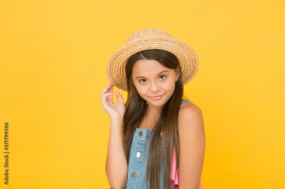 Enjoying vacation. Good vibes. Beach style. Little beauty in straw hat. Fancy outfit. Teen girl summer fashion. Summer holidays. Portrait of happy cheerful girl in summer hat yellow background