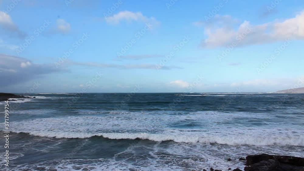 beautiful seascape, blue waves with white foam run ashore, concept vacation, travel, trip, ecology, environmental protection beautiful seascape, blue waves with white foam run ashore, concept vacation, travel, trip, ecology, environmental protection