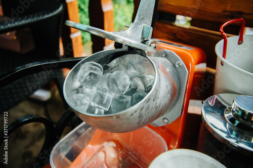 ice cubes in an ice crusher photo