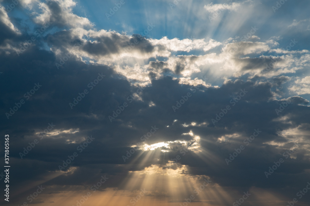 Beautiful dramatic sky with sun rays. Wallpaper background Broad Daylight Beautiful dramatic sky with sun rays. Wallpaper background Broad Daylight