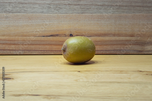 kiwi fruit on a wooden table