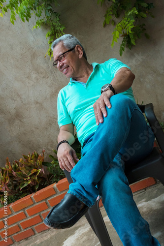 Wallpaper Mural Relaxed adult male in the backyard of a house. Torontodigital.ca