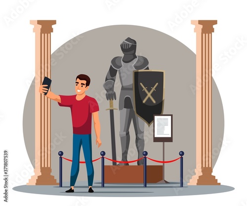 Man taking selfie with knight at historic museum
