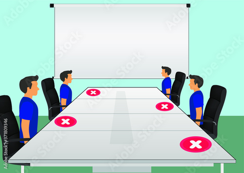Social distance at meeting room. People are working together at office with maintaining social distance.