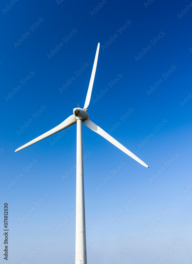 windmills group with cloudy and blue sky, on the west coast of Taiwan. windmills group with cloudy and blue sky, on the west coast of Taiwan.