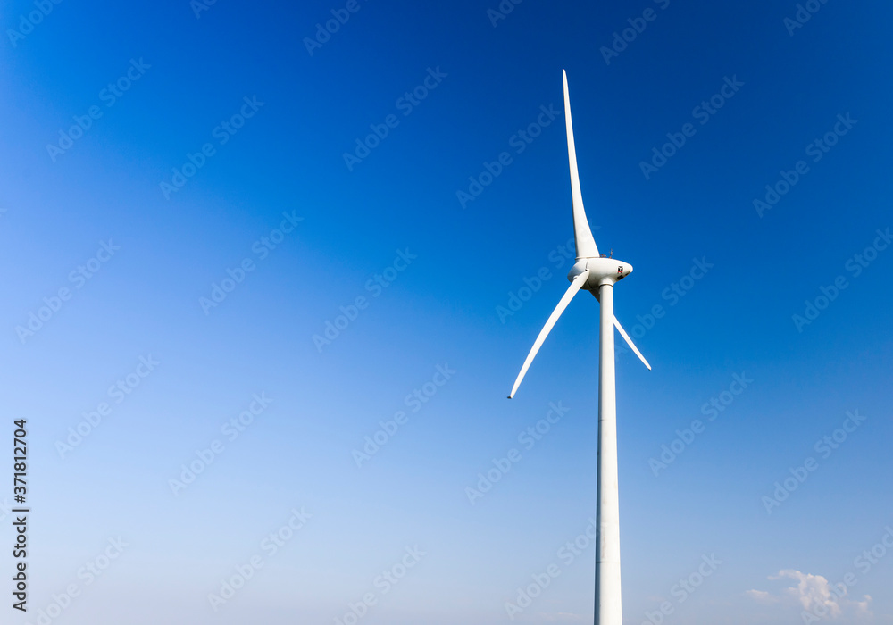 windmills group with cloudy and blue sky, on the west coast of Taiwan. windmills group with cloudy and blue sky, on the west coast of Taiwan.