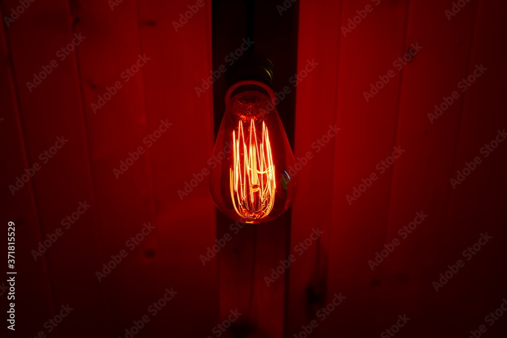 light bulb hanging on a wall