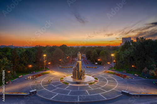 Shevchenko park of Kharkiv in sunset colors and evening lights, Ukraine photo