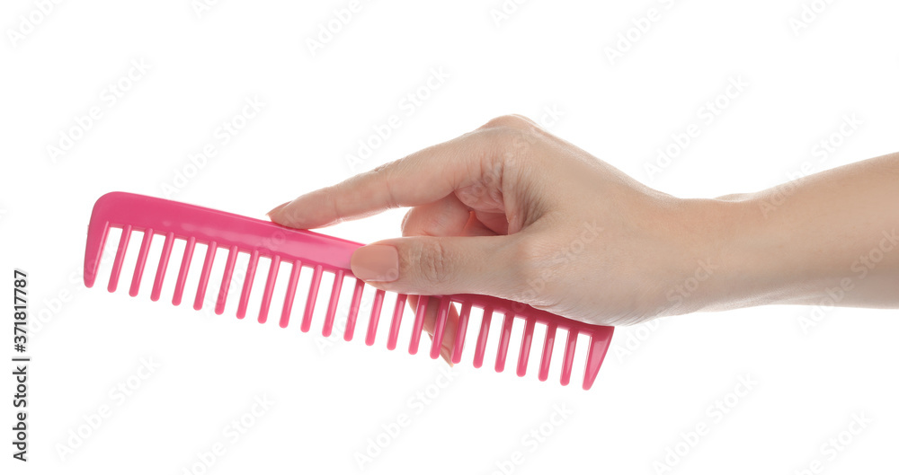Naklejka premium Woman holding hair comb on white background, closeup